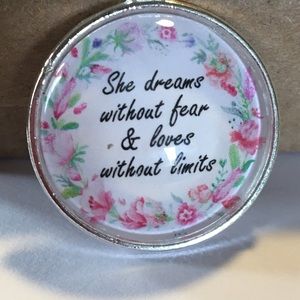 She dreams necklace or keychain
